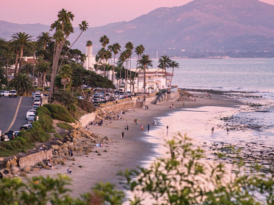 The Montecito coastline at sunset, looking along the beach toward the mountains